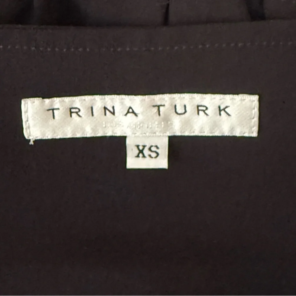 Trina Turk Black Sleeveless Top with Gold Zipper. Size XS